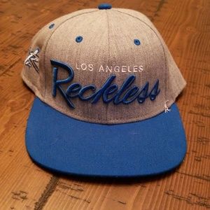 young and reckless snap back cap